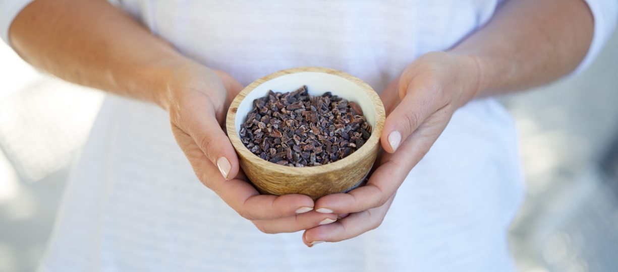 person holding bowl of cacao