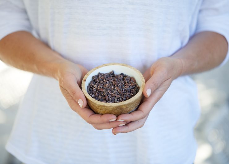 person holding bowl of cacao