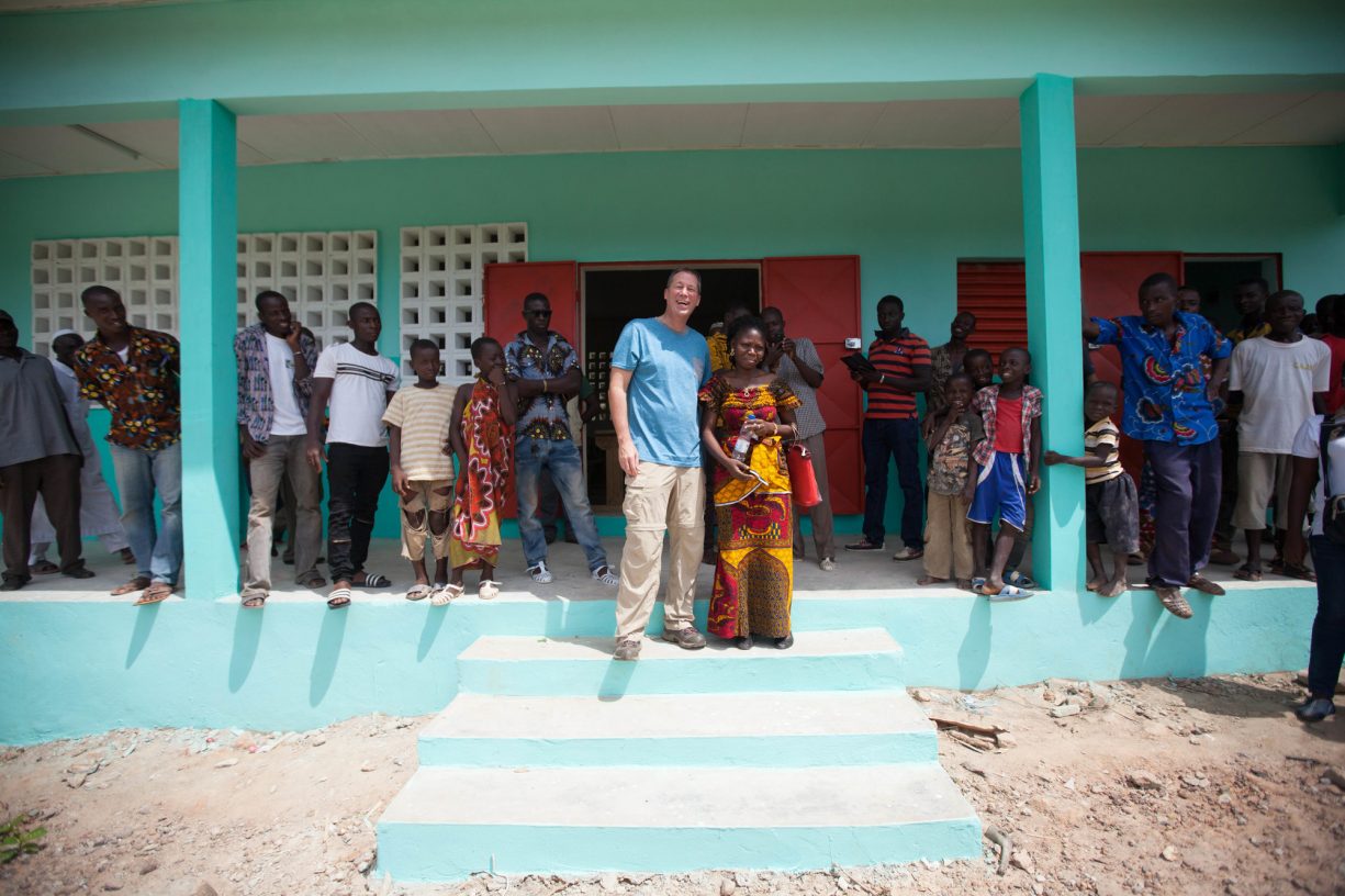 CEO of Endangered Species Chocolate, Curt Vander Meer with members of a cocoa farming community in Cote d'Ivoire.