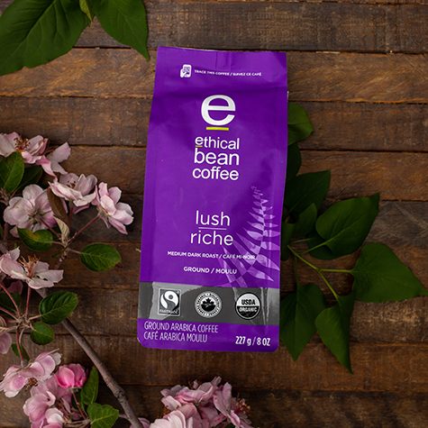 Vibrant purple bag of Fairtrade certified Lush coffee from Ethical Bean