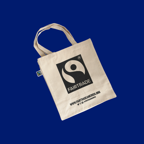 Fairtrade tote bag on a blue background