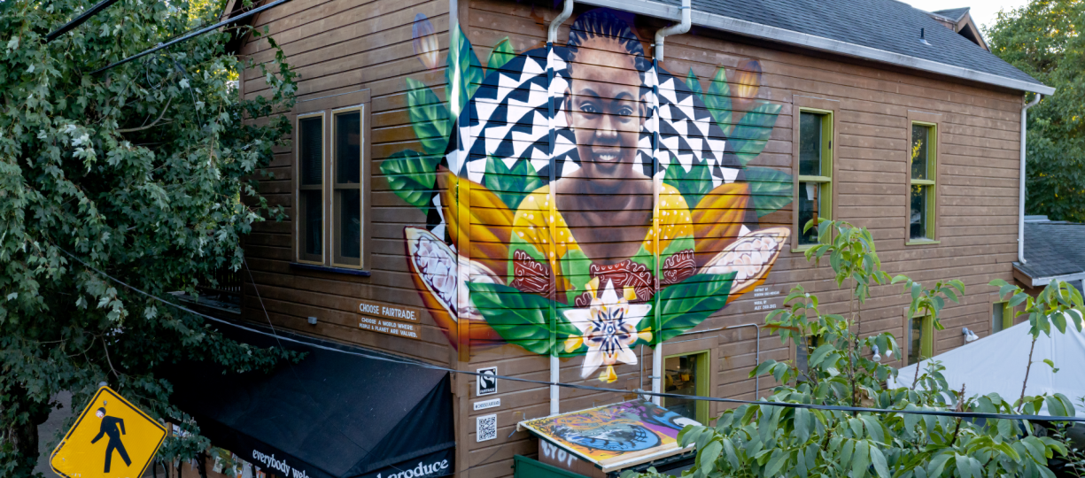 Mural of Fairtrade cocoa farmer, Deborah Osei-Mensah that can be found at the People's Food Co-op in Portland, Oregon.