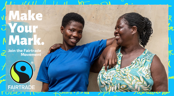 Two farming women with their arms around each other. "Make your mark. Join the Fairtrade movement." in the top left corner. The Fairtrade logo in the bottom left.